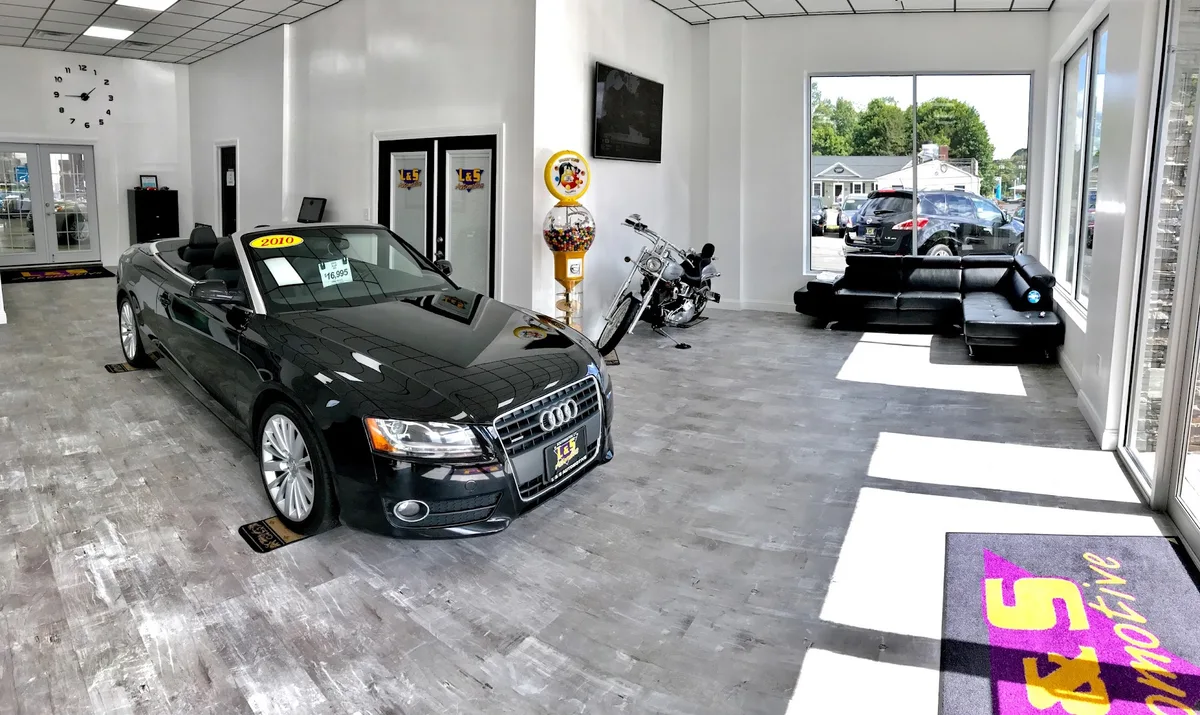 Vehicles displayed inside the L & S Automotive showroom