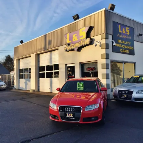 L & S Automotive exterior with the service building and vehicle lot